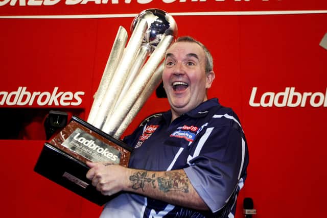 The first Sid Waddell Trophy was presented to Phil Taylor in 2013 (Photo by Ben Hoskins/Getty Images)