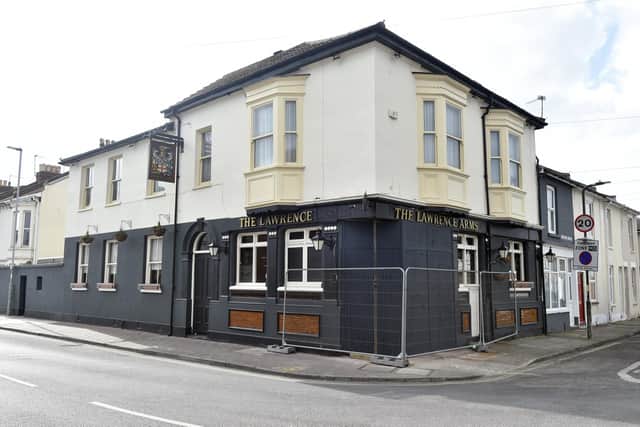 Repairs are currently under way at The Lawrence Arms on Lawrence Road, Southsea. A car tore a hole in the building last month and landlady Alison Wearn has confirmed the pub will remain closed for three months.
Picture: Sarah Standing