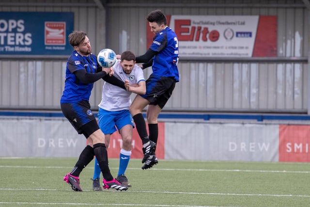 Clanfield (blue) v Andover New Street Swifts. Picture by Alex Shute