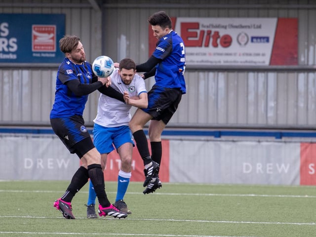 Clanfield (blue) v Andover New Street Swifts. Picture by Alex Shute