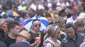 Festival goers brave the wet weather during the Isle of Wight festival. Picture:: Ed Lawrence/PA Wire