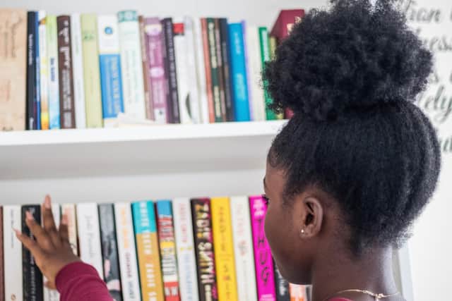 Girl in library. 
Picture credit: Portsmouth City Council