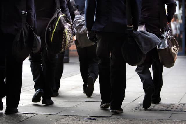 School absence rates which worsened during the pandemic have seen "no significant improvement" and are "of great concern", the Education Committee said. Photo by David Jones/PA Wire