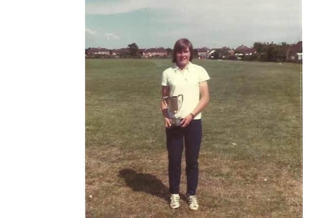 Debbie Wood with a trophy