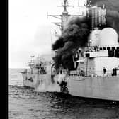 HMS Sheffield burns shortly after being hit by an Argentine Exocet missile, on 4/5/1982, whilst on RADAR picket duties off the coast of the Falkland Islands.  