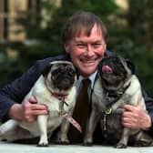 Conservative MP David Amess with his pugs, Lily and Boat.