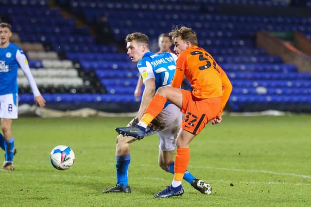 Charlie Bell in action for Pompey against Peterborough in this season's Papa John's Trophy