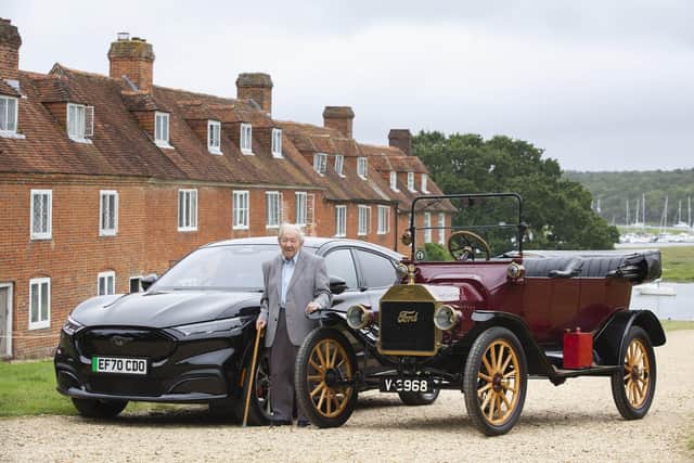 101-year-old Harold Baggott stands alongside the new Mustang Mach-E, Ford's first all-electric SUV and a Model T from 1915 at the Beaulieu Motor Museum, before taking the Mach-E for a test drive Picture: Matt Alexander/PA Wire