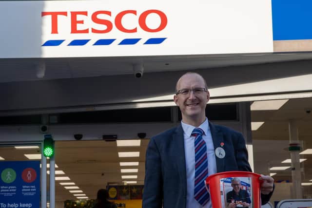 Rob Milner, store manager of Tesco in Cosham helped raise over £4,500 for the victims of the Nelson Avenue house explosion. Photos by Alex Shute