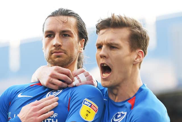 Christian Burgess and Sean Raggett have yet to have their participation in the play-offs confirmed. Picture by FRANK REID.