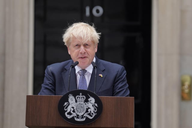 Prime Minister Boris Johnson reads a statement outside 10 Downing Street, London, formally resigning as Conservative Party leader after ministers and MPs made clear his position was untenable. He will remain as Prime Minister until a successor is in place.