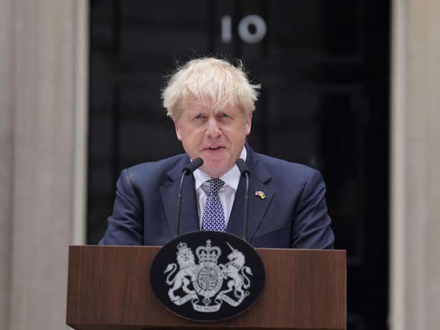 Prime Minister Boris Johnson reads a statement outside 10 Downing Street, London, formally resigning as Conservative Party leader after ministers and MPs made clear his position was untenable. He will remain as Prime Minister until a successor is in place.