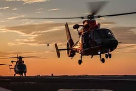 United States Coast Guard Dolphins conduct night flying with HMS Prince Of Wales. Picture: LPhot Finn Stainer-Hutchins.