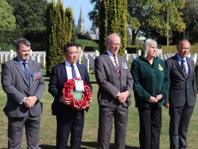 Alan Mak MP and veterans visiting the Bayeux War Cemetery to commemorate the 75th anniversary of D-Day in 2019