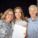 Students found out their A Level results this morning at Portsmouth High School as they prepare for their next steps in education.Pictured - Maia, 18 with Mum and Dad, heading to Cardiff University to study Politics and International Relations. Photos by Alex Shute