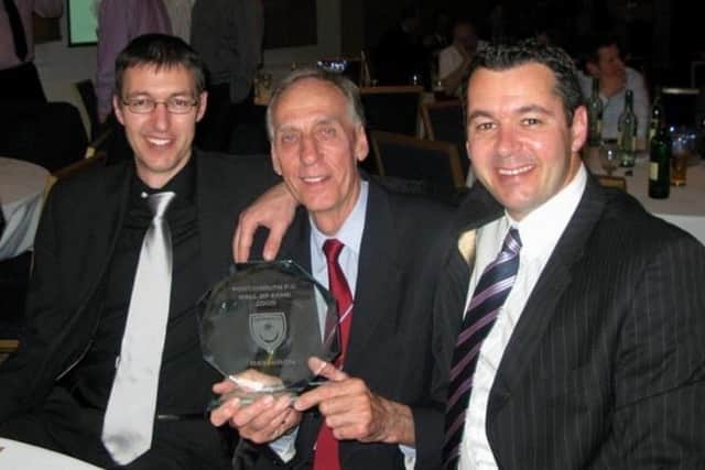 Ray Hiron with sons Tony (right) and Steve (left) upon his induction into Pompey's Hall of Fame in 2009