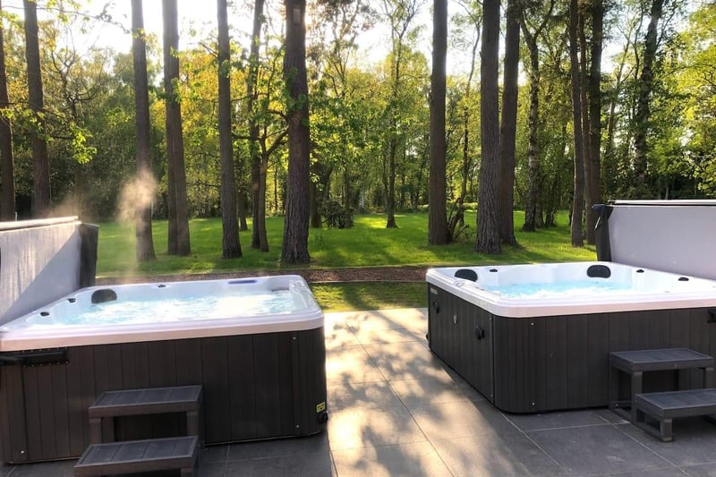 Along with beautiful gardens and large grass playing area, two hot tubs are also available at extra cost.