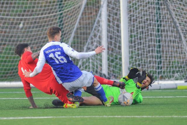 The Sway keeper comes out to collect the ball against Denmead at Front Lawn. Picture: Martyn White