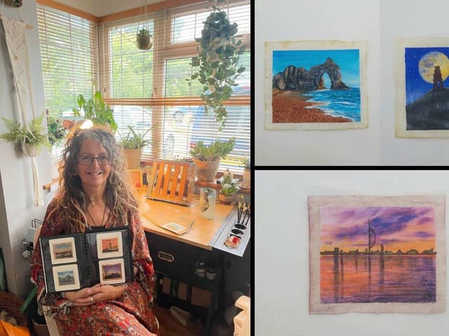 Caroline West with some of her artwork, which consists of painting famous UK landmarks on used teabags.