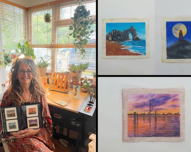 Caroline West with some of her artwork, which consists of painting famous UK landmarks on used teabags.