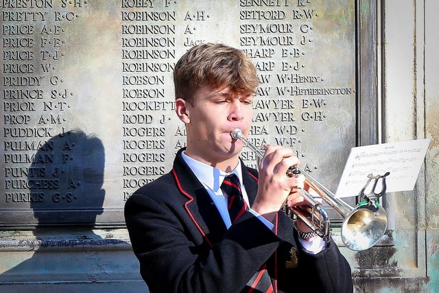 Ben Robinson, 15, plays The Last Post. Perhaps by chance, there are some Robinsons on the Cenotaph wall behind him. Armistice Day Service, World War I Cenotaph, Guildhall Square, Portsmouth
Picture: Chris Moorhouse (jpns 111123-21)