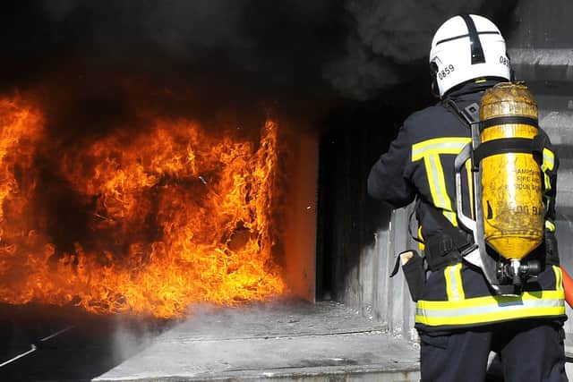 Hampshire Fire & Rescue Service's Arson Task Force gave 'live burn' demonstrations to the media and crime scene investigators. Picture: Malcolm Wells (170922-2843)