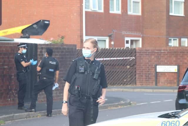 Police at the scene of a bungalow fire in Aspengrove, Gosport, this evening. Photo: Habibur Rahman