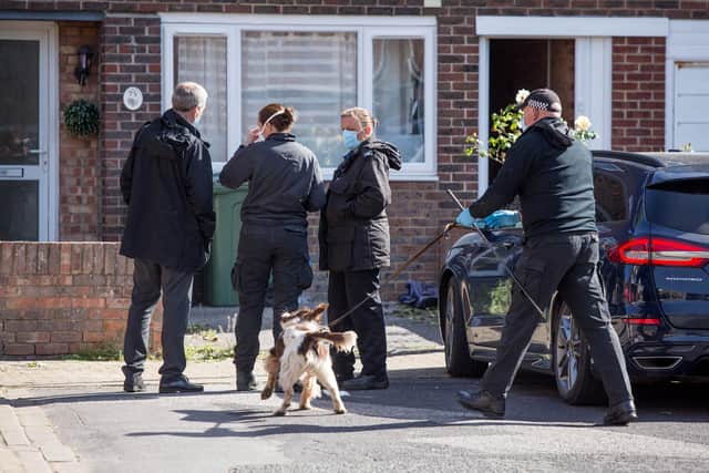 Police and a sniffer dog have been seen in a street near to where an infant girl was found dead.Pictured: Uniformed and plainclothes officers in All Saints Road, Buckland on Tuesday 12 May 2020.Picture: Habibur Rahman