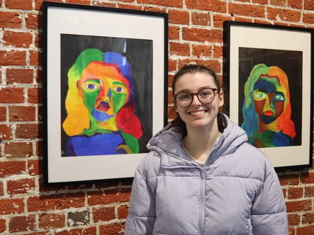 Morgan Pople with her artwork, which was inspired by emotions and colour psychology.