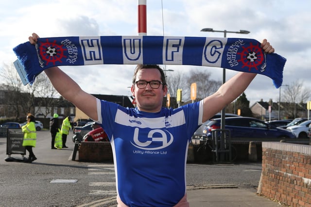 A Hartlepool United fan shows off his Pools scarf before the match on Saturday.