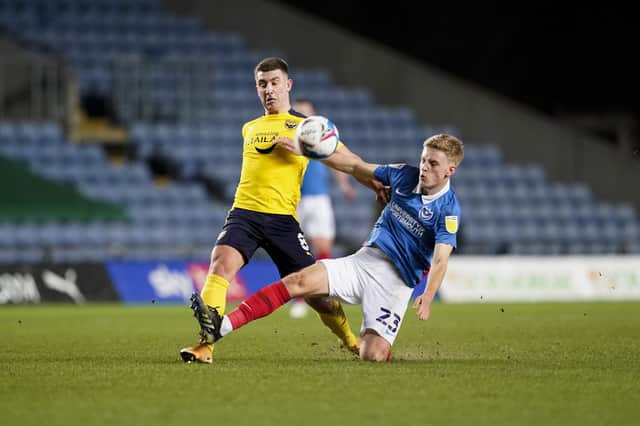 Harvey White, on his full debut, tackles Oxford's Cameron Brannagan in tonight's clash. Picture: Jason Brown/ProSportsImages