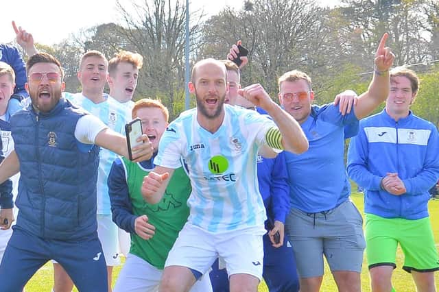 Tom Jeffes (middle) and his US Portsmouth team-mates celebrate last weekend's FA Vase fifth round victory at Tavistock. Picture: Martyn White.