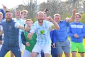 Tom Jeffes (middle) and his US Portsmouth team-mates celebrate  last weekend's FA Vase fifth round victory at Tavistock. Picture: Martyn White.