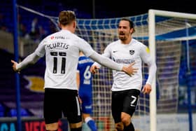 Ryan Williams celebrates with Ronan Curtis after handing Pompey a 2-0 lead in Saturday's victory at Ipswich. Picture: Simon Davies/ProSportsImages