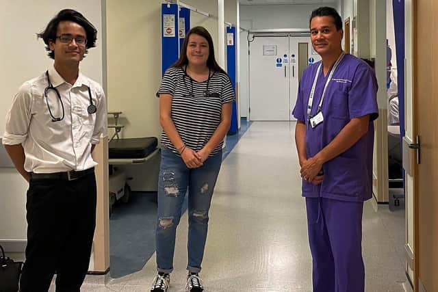 Manish Patel (right) with two of the students who start medical school this month