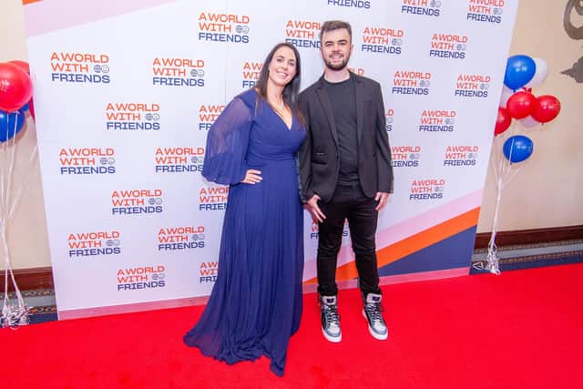 A World With Friends founder Lewis Hine with his mum Emma on the red carpet at last year's charity prom at Portsmouth Guildhall. Businesses are being called on to sponsor a table at this year's event in August. Picture: Habibur Rahman