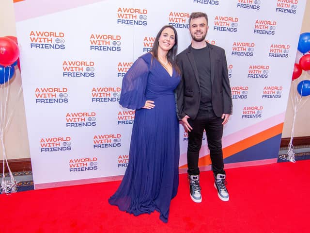 A World With Friends founder Lewis Hine with his mum Emma on the red carpet at last year's charity prom at Portsmouth Guildhall. Businesses are being called on to sponsor a table at this year's event in August. Picture: Habibur Rahman