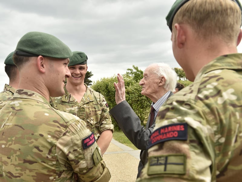 Pictured is: Former Royal Marine (middle) Keith Whiting (99) from Northampton,Picture: Sarah Standing (030624-3280)