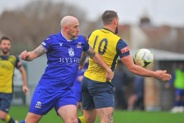 Baffins defender Lee Molyneaux and  Moneyfields striker Steve Hutchings. Picture: Martyn White