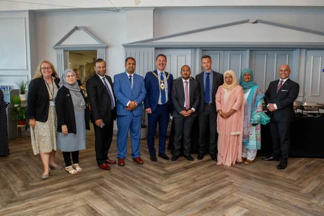 Portsmouth Bangladesh Business Association is holding their annual network and business meeting at The Gaeity Bar, Southsea on Monday 20 September 2021Pictured: PBBA members with cllr Rob WoodPicture: Habibur Rahman