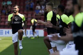 Summer signing Marlon Pack warms up for Saturday's game against Cheltenham with his Pompey team-mates     Picture: Jason Brown