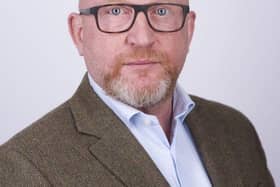 Martin Flick, CEO of Onecom Group.