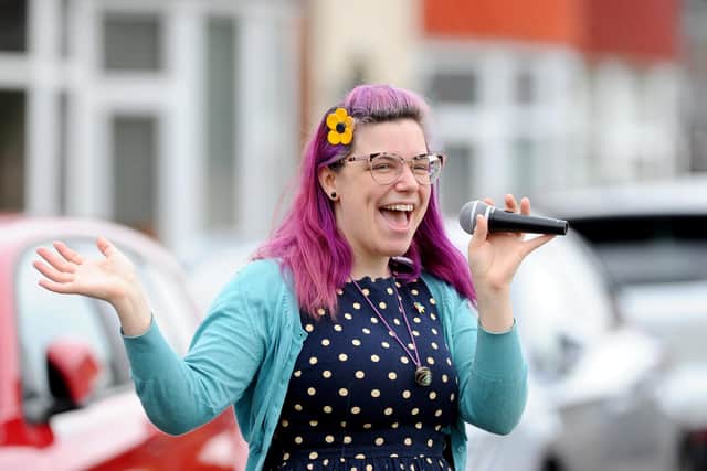 Becki Short, a professional singer and vocal coach, performed for the third week running for the residents of Moneyfields Lane, where she lives, and Keswick Avenue in Portsmouth. Picture: Sarah Standing (180420-935)