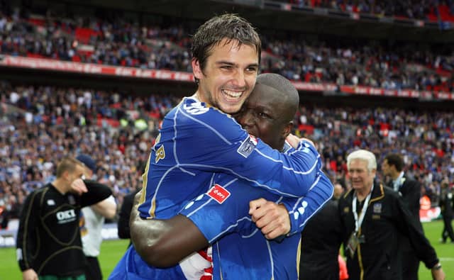 Niko Kranjcar, pictured with Papa Bouba Diop, celebrates winning the FA Cup with Pompey in May 2008. Picture: Joe Pepler