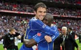 Niko Kranjcar, pictured with Papa Bouba Diop, celebrates winning the FA Cup with Pompey in May 2008. Picture: Joe Pepler