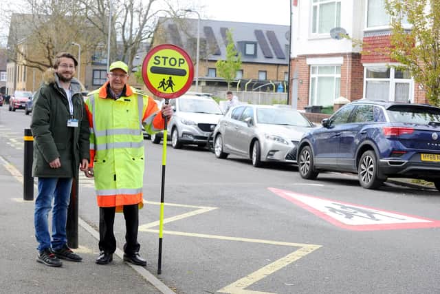 Dennis Hogger (83) the Lollipop man is a popular figure in Hilsea and has been campaigning for nine years to get a safety sign put up for his crossings in Doyle Avenue. Picture: Sarah Standing (240423-6957)