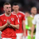 Joe Morrell featured in two of Wales' group stage games at the 2022 World Cup in Qatar   Picture: Justin Setterfield/Getty Images