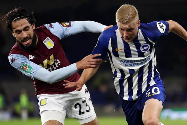 Brighton's Alex Cochrane battles Aston Villa's Jota for the ball. Picture: Bryn Lennon/Getty Images