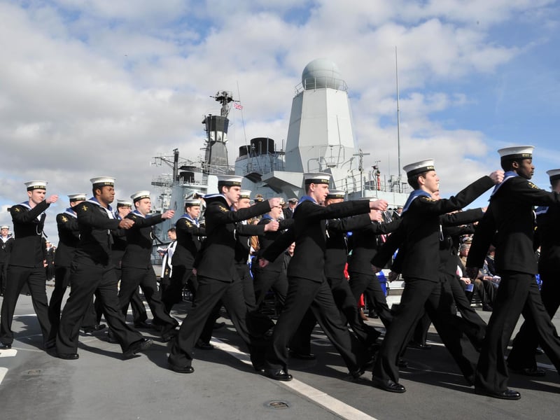 Sailors marching onboard HMS Ark Royal 11th March 2011. Picture: Steve Reid.
