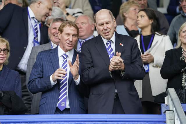Michael Eisner, right, with son Eric at Fratton Park for Pompey's game against Shrewsbury last October.